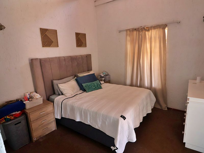 Sunlit Comfort with Fireplace Charm - Photo 10