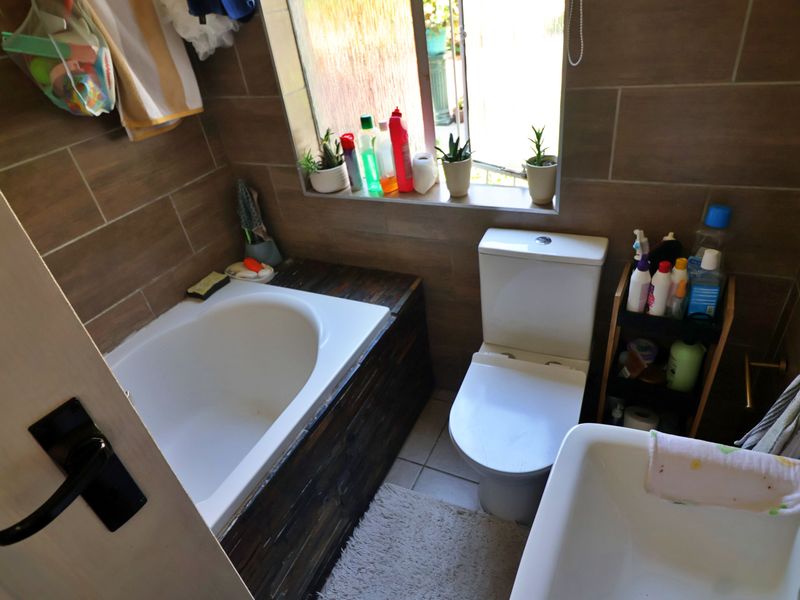 Sunlit Comfort with Fireplace Charm - Photo 9