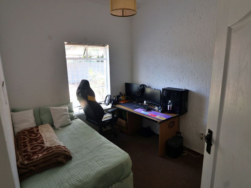 Sunlit Comfort with Fireplace Charm - Photo 7