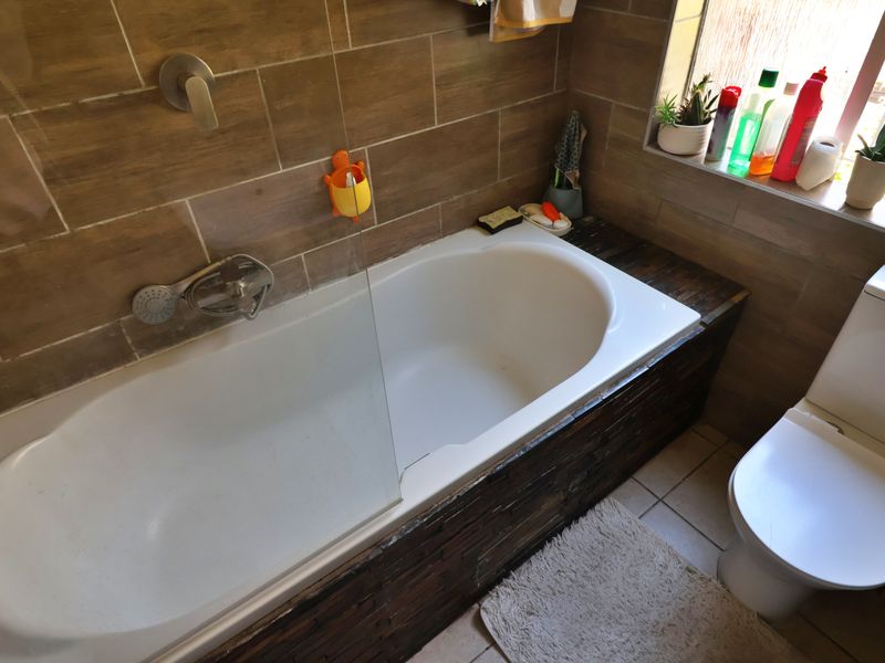 Sunlit Comfort with Fireplace Charm - Photo 8