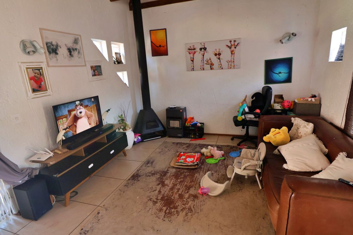 Sunlit Comfort with Fireplace Charm - Photo 3