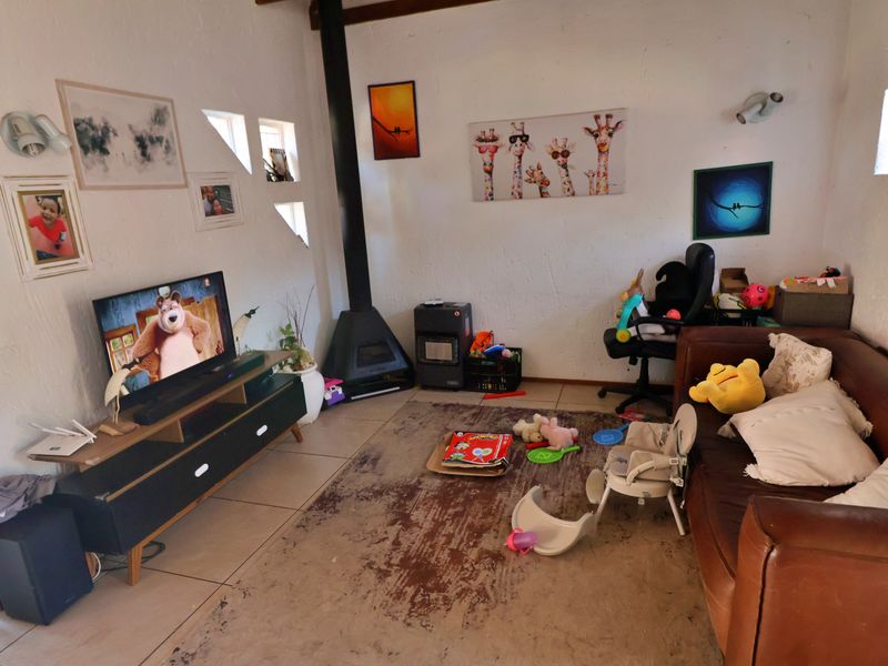 Sunlit Comfort with Fireplace Charm - Photo 3