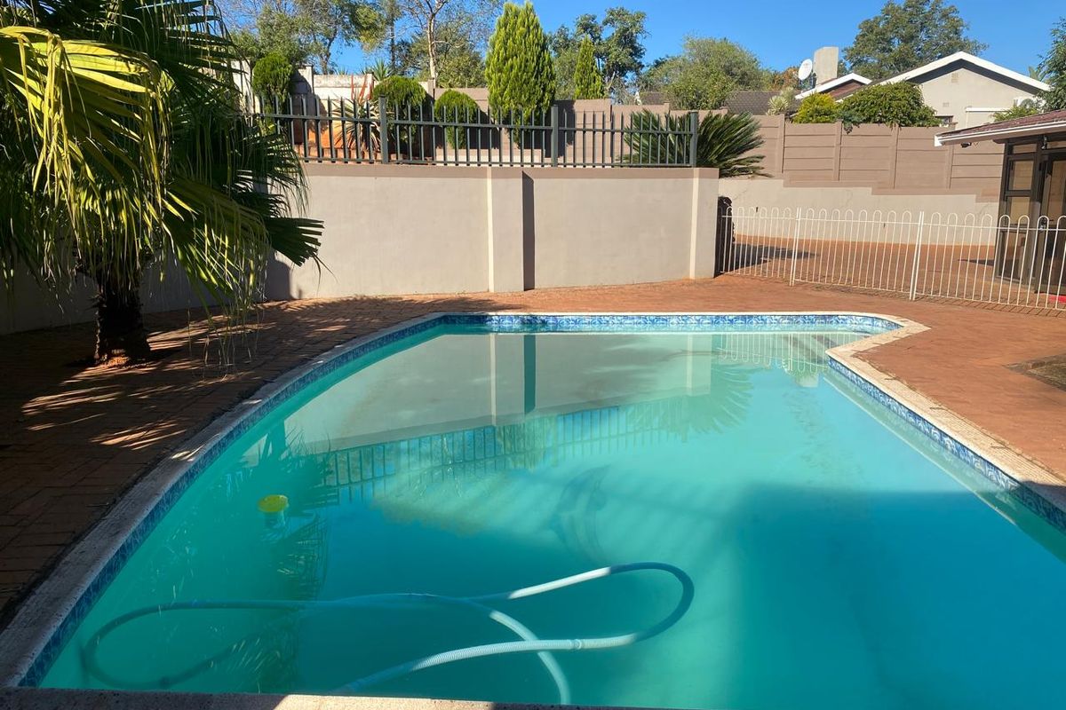 Secure Family Home with Cottage, Pool & Investment Potential - Photo 2