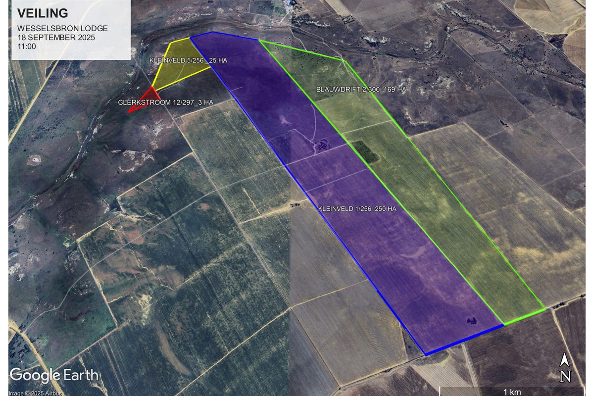 An aerial view of the farm property showing demarcated land parcels and boundaries for Wesselsbron Lodge.