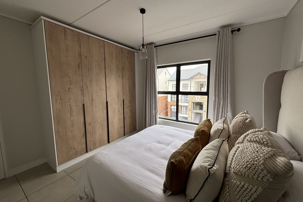 Modern 2-Bedroom Apartment in The Reid Lifestyle Estate - Photo 2