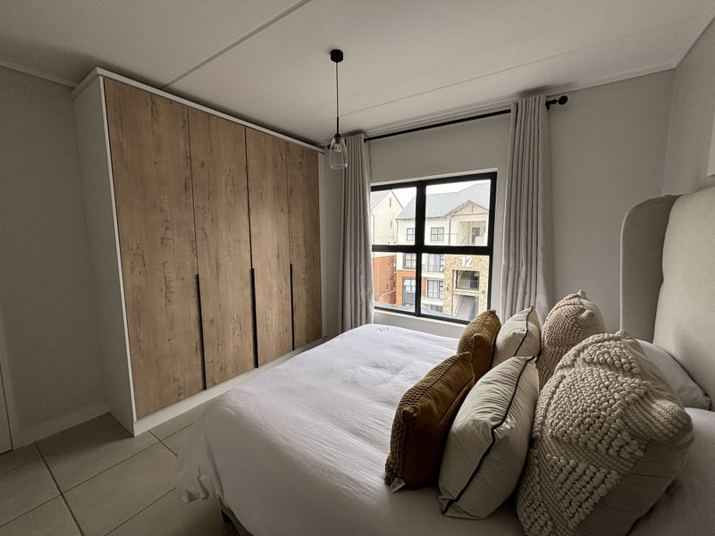 Modern 2-Bedroom Apartment in The Reid Lifestyle Estate - Photo 2