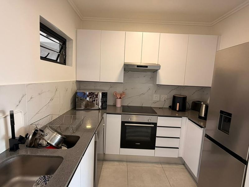 Modern 3-Bedroom 2 Bathroom Apartment with Backup Power at Key West - Photo 10