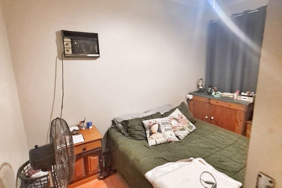 Prime Investment Opportunity: Three-Bedroom Simplex in Heart of Arboretum - Photo 3