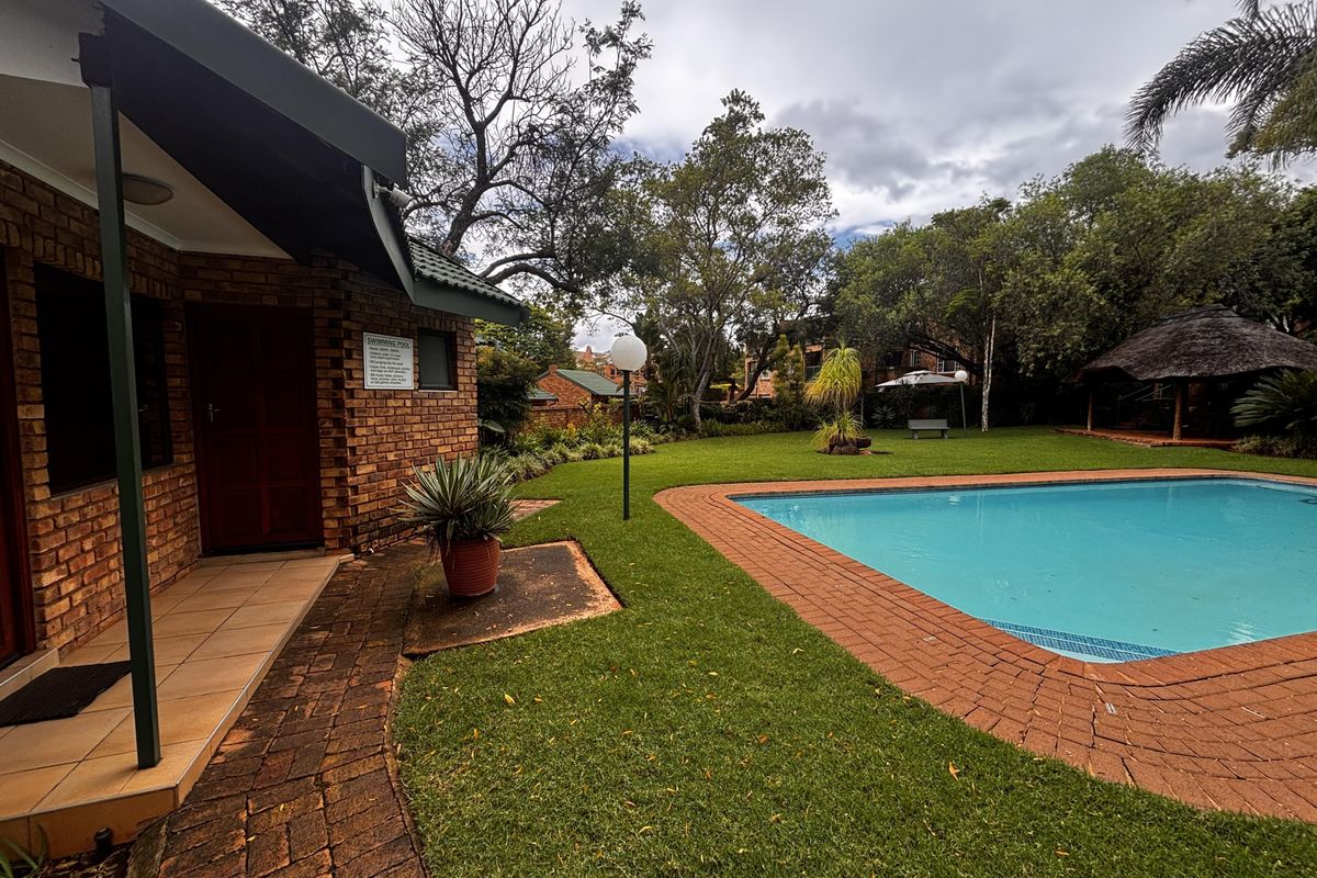 Safe and Stylish Lock Up and Go with a Wonderful Pool - Photo 2