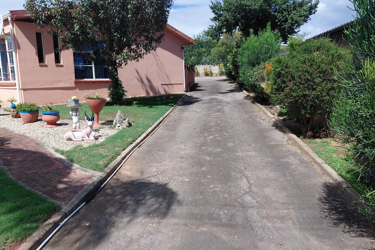 Neat Family Home with Spacious Living Areas in Bothasrus - Photo 4