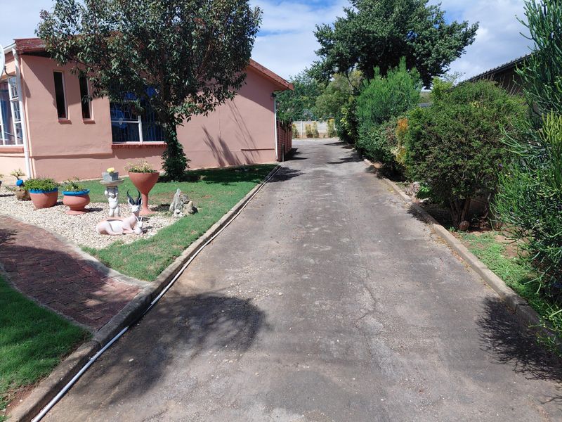 Neat Family Home with Spacious Living Areas in Bothasrus - Photo 4