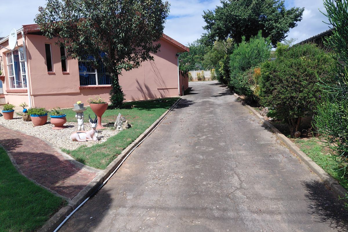 Neat Family Home with Spacious Living Areas in Bothasrus - Photo 5