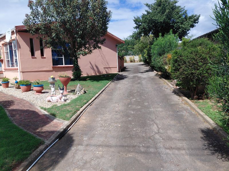 Neat Family Home with Spacious Living Areas in Bothasrus - Photo 5