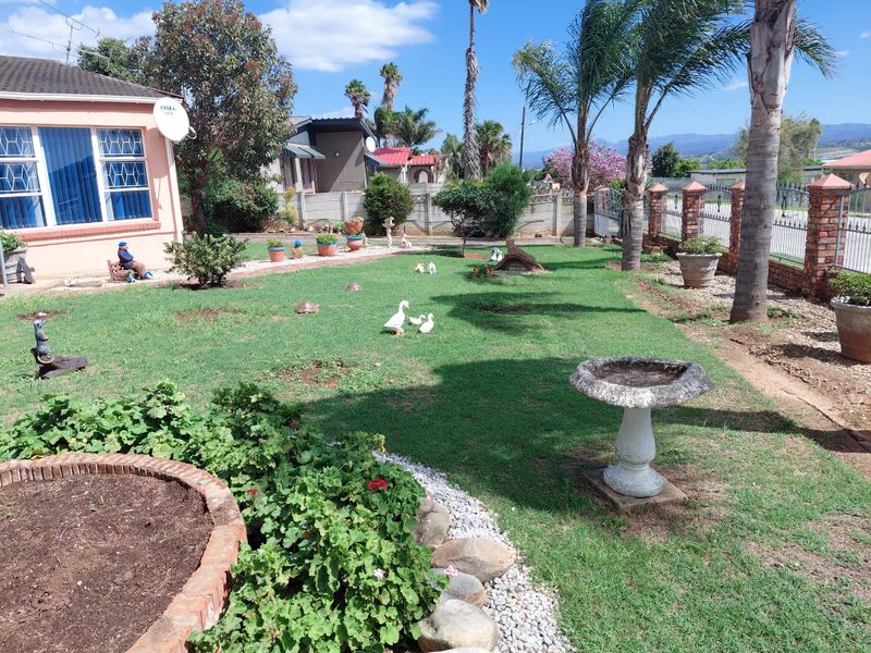 Neat Family Home with Spacious Living Areas in Bothasrus - Photo 3