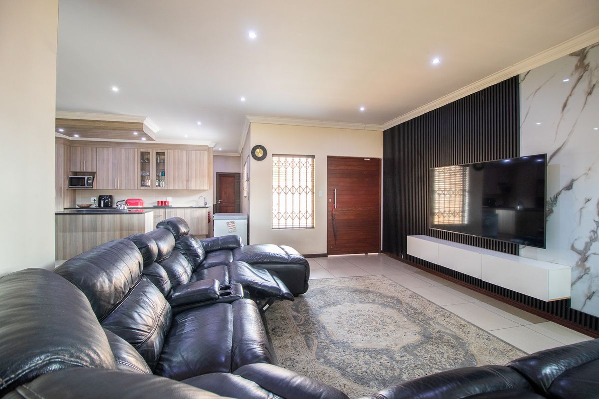 Secure & Spacious Gem- Immaculate - with Ample Parking on a Prime Stand - Photo 4