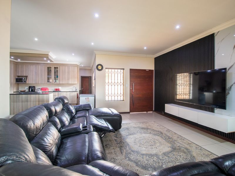 Secure & Spacious Gem- Immaculate - with Ample Parking on a Prime Stand - Photo 4