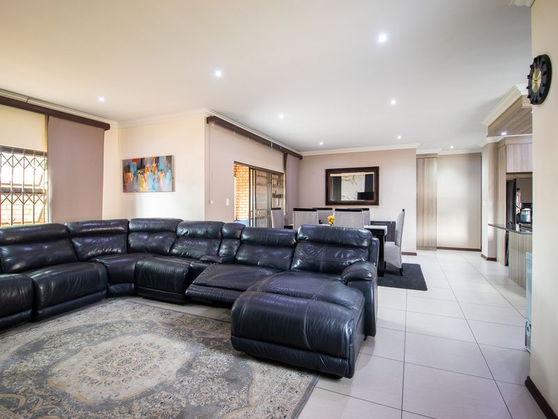 Secure & Spacious Gem- Immaculate - with Ample Parking on a Prime Stand - Photo 3