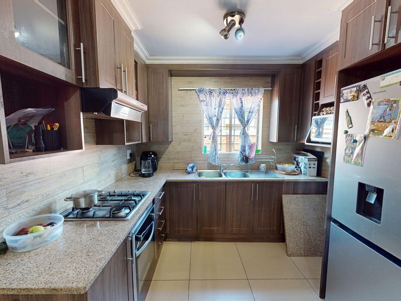 Three bedroom townhouse for sale in Pretoria West - Photo 5