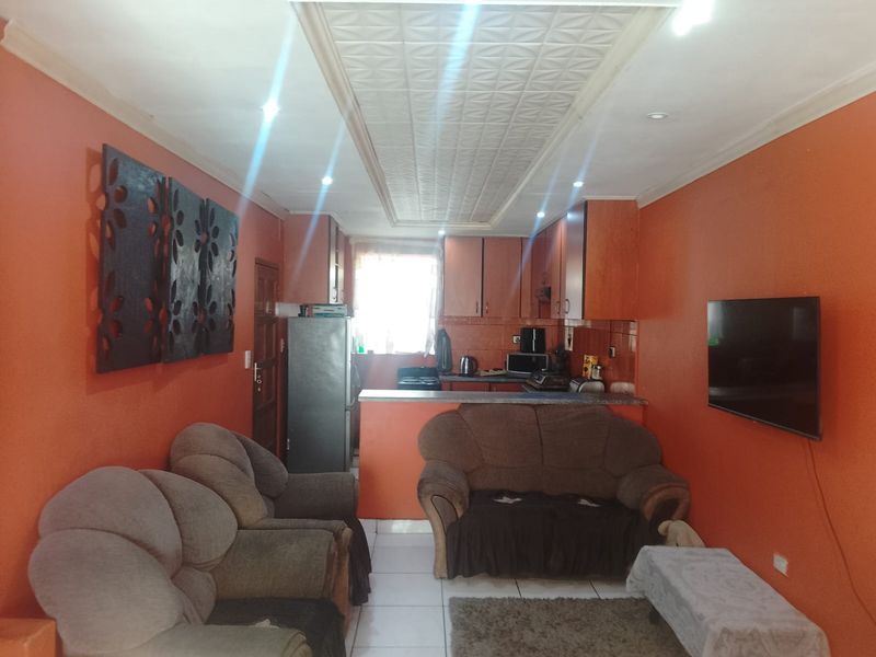 ' Charming Double Storey Family Home On The Main Road " - Photo 5