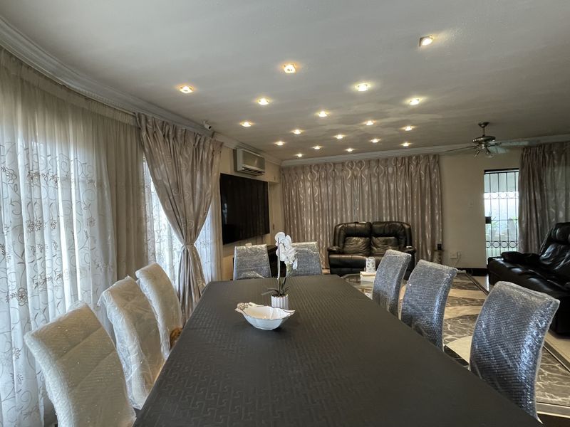 Elegant Family Living in Sought-After Coronet Place - Photo 6