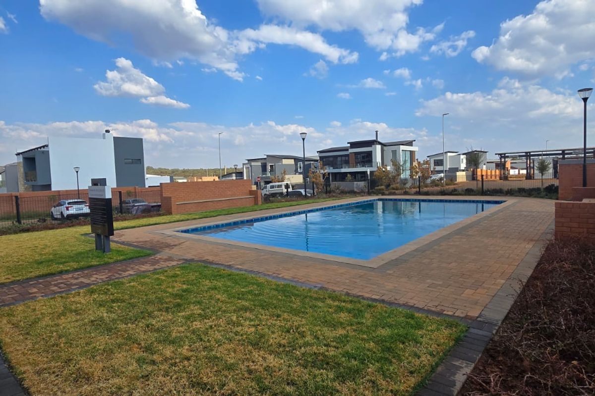 Bold Double-Volume Living with L-Shaped Pool, PJ Lounge, Balcony & Boma - Photo 5