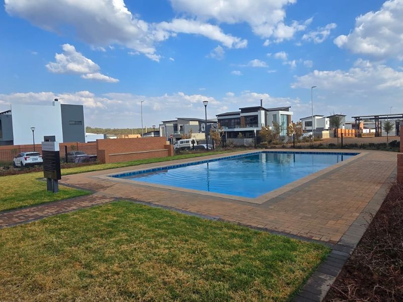 Bold Double-Volume Living with L-Shaped Pool, PJ Lounge, Balcony & Boma - Photo 5