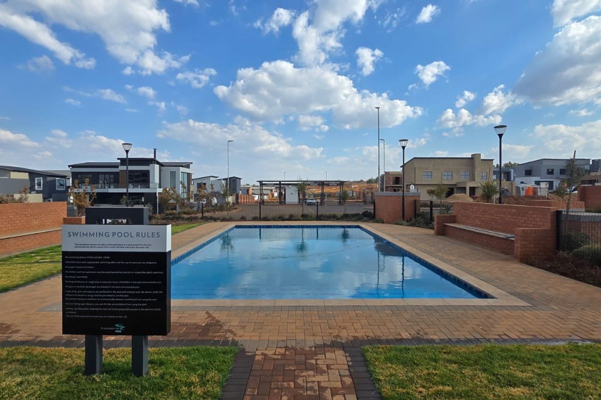 Bold Double-Volume Living with L-Shaped Pool, PJ Lounge, Balcony & Boma - Photo 4