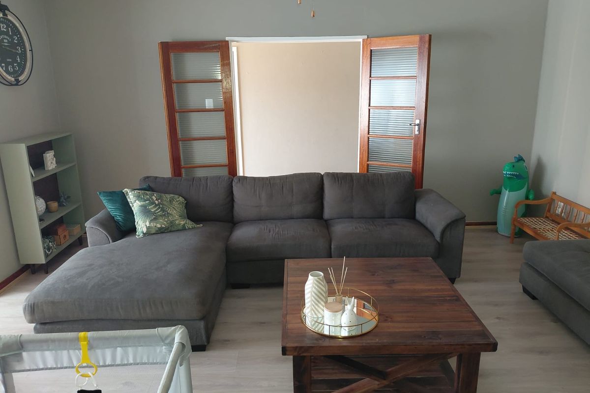 Spacious Family Home with Braai Room & Pool in Quiet Bothasrus - Photo 5