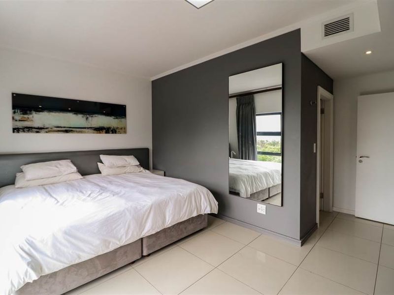 Set in the heart of Sandton, this stylish apartment blends modern comfort and convenience. - Photo 8