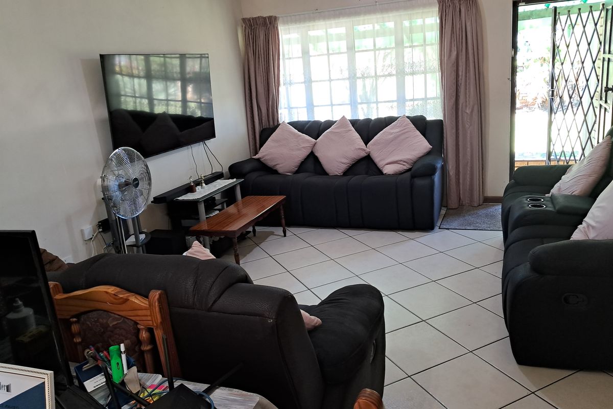 Modern Family Living in Sought-After Hayfields with Pool & Entertainment Area - Photo 4