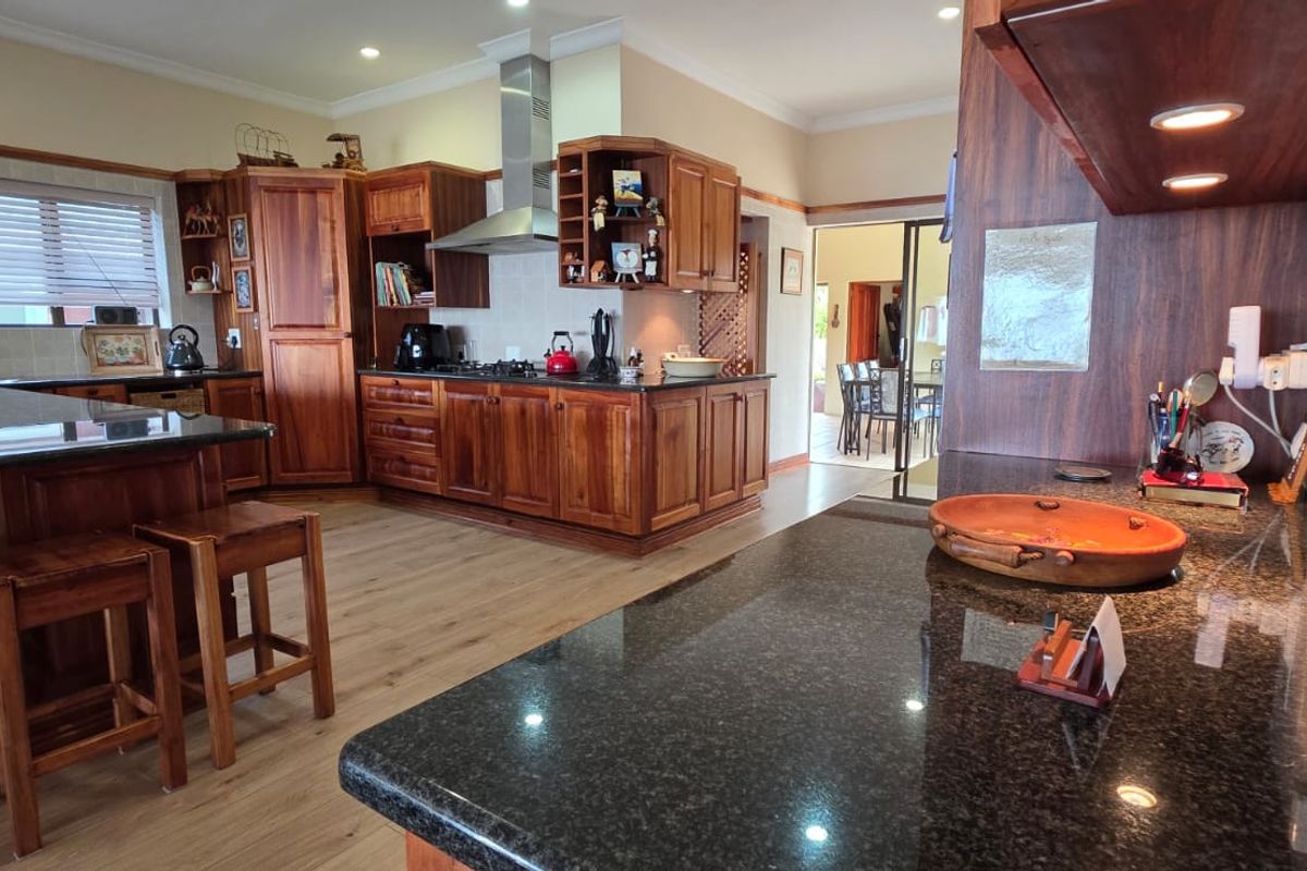 This well-located home offers comfort, tranquility, and scenic surroundings right from your bedroom - Photo 5