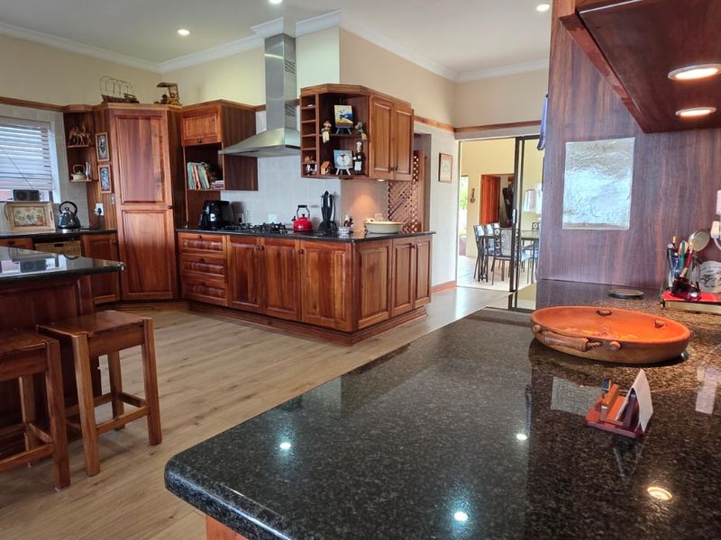 This well-located home offers comfort, tranquility, and scenic surroundings right from your bedroom - Photo 5