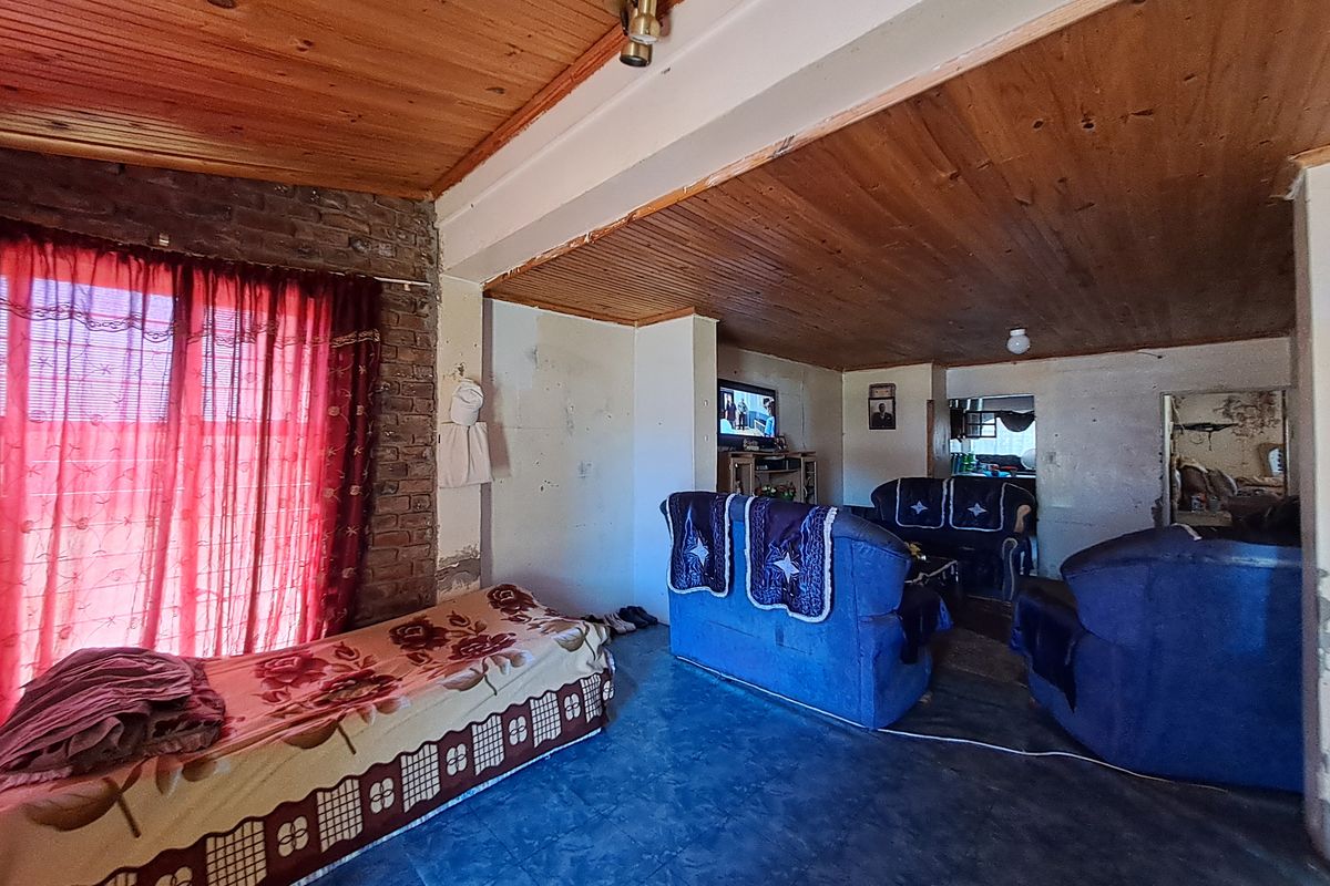 Spacious 5-Bedroom Home with Braai Area and Room to Grow - Photo 5