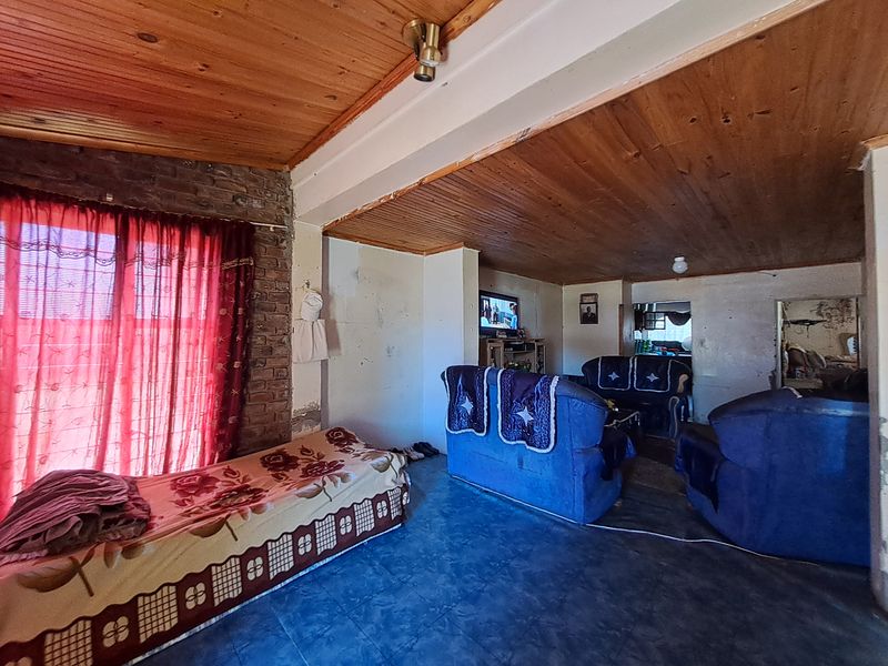 Spacious 5-Bedroom Home with Braai Area and Room to Grow - Photo 5