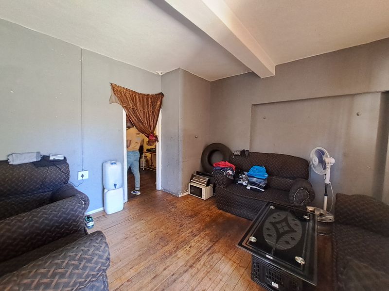 Spacious 5-Bedroom Home with Braai Area and Room to Grow - Photo 4