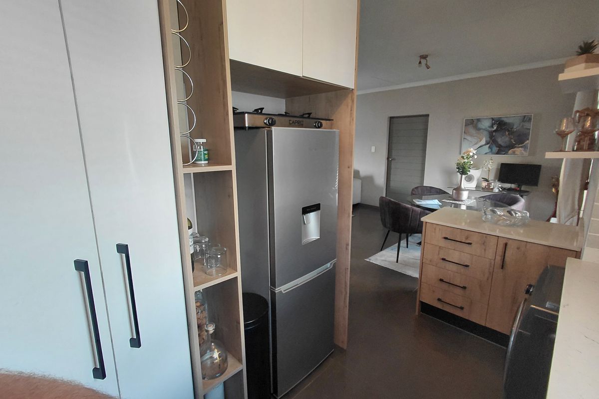 Don't Miss This Stunning 2 Bedroom and 2 Bathroom With A Stunning Balocony With A Built In Braai - Photo 4