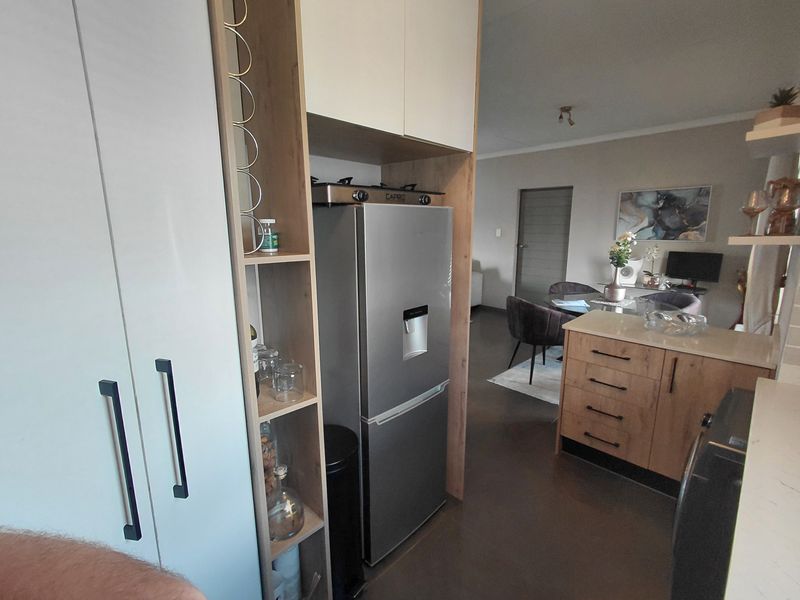 Don't Miss This Stunning 2 Bedroom and 2 Bathroom With A Stunning Balocony With A Built In Braai - Photo 4