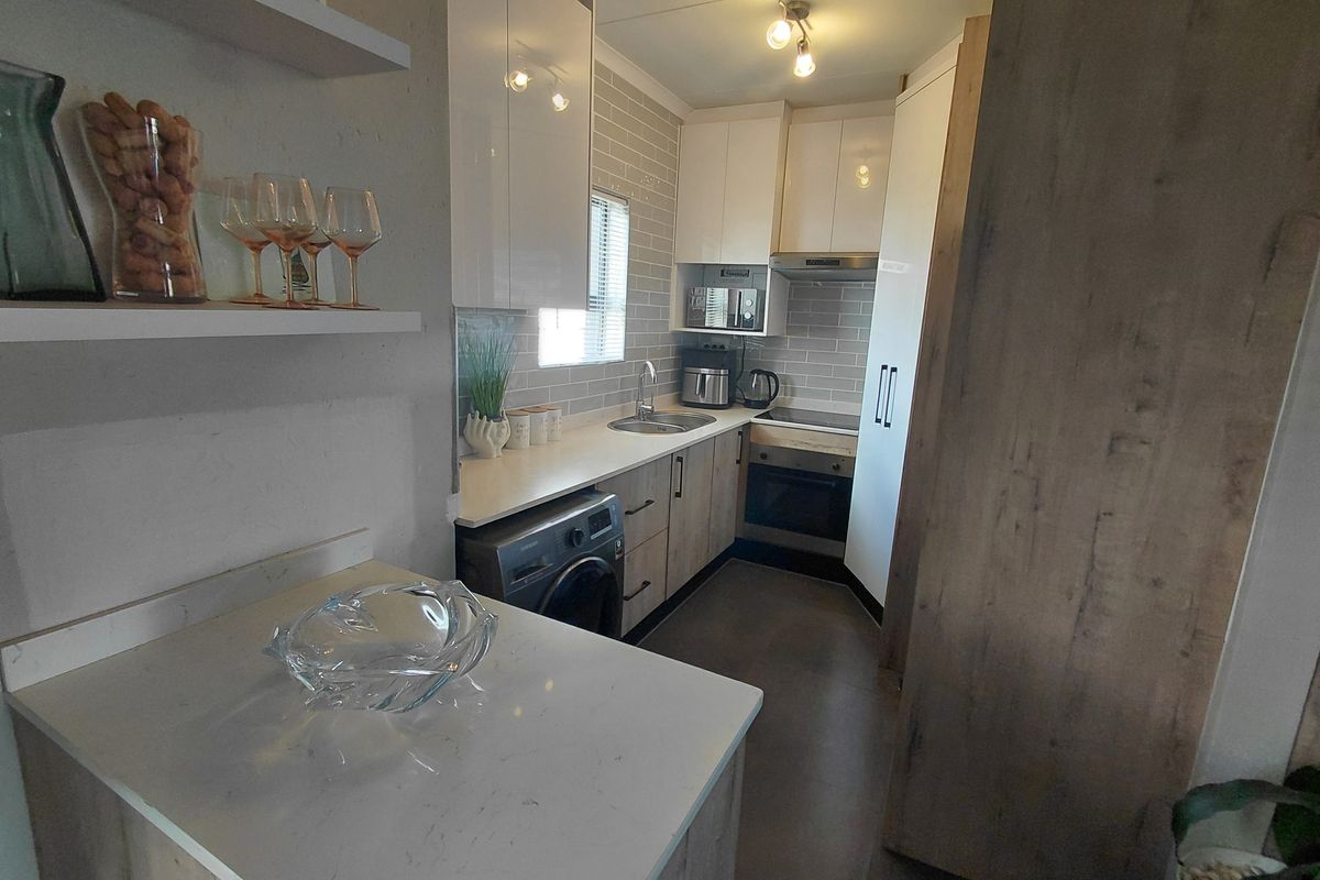 Don't Miss This Stunning 2 Bedroom and 2 Bathroom With A Stunning Balocony With A Built In Braai - Photo 3