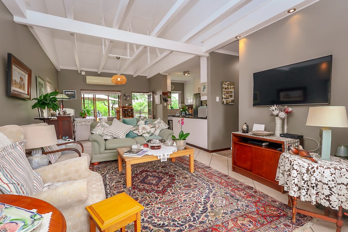 Charming Renovated Home with Private Garden and Seamless Indoor-Outdoor Living - Photo 2