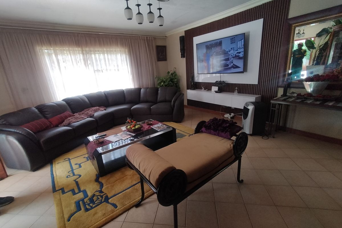 Spacious Family Home with Borehole, Fruit Trees and Excellent Outdoor Living in The Orchards - Photo 2