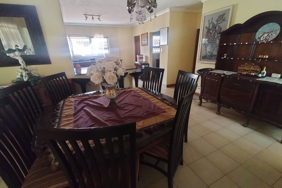 Spacious Family Home with Borehole, Fruit Trees and Excellent Outdoor Living in The Orchards - Photo 4