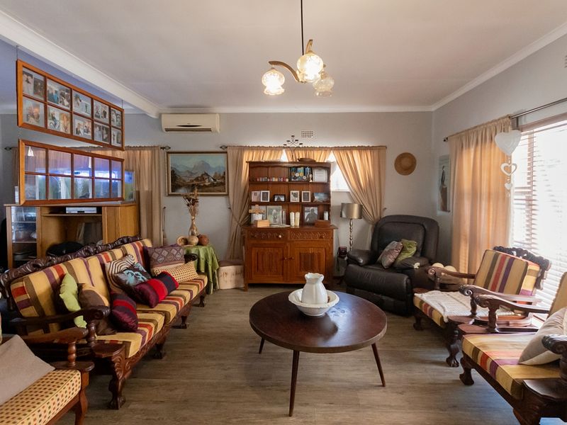 Stylish 4 Bedroom Home with Entertainer’s Braai Room and Large Erf - Photo 8
