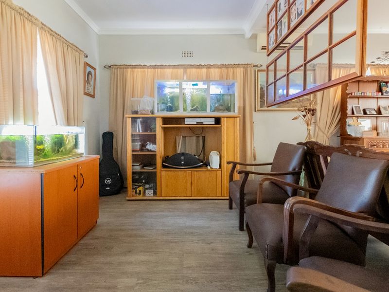 Stylish 4 Bedroom Home with Entertainer’s Braai Room and Large Erf - Photo 10