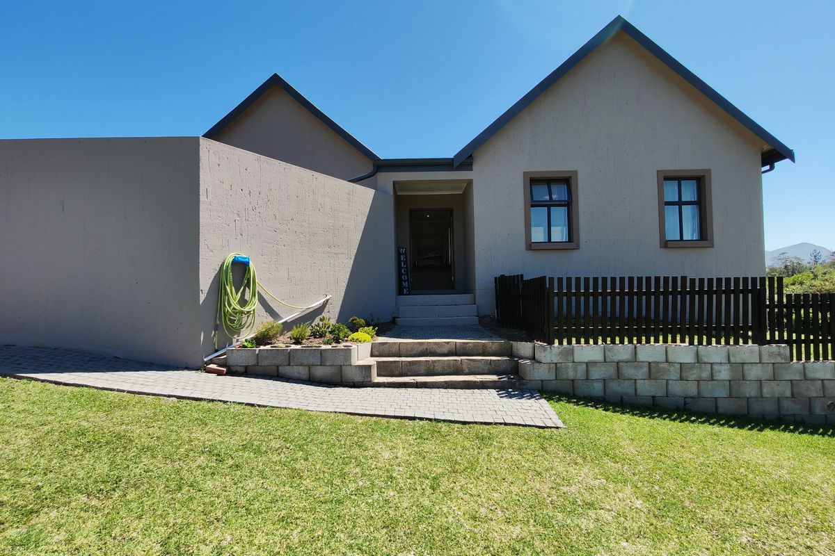 Modern 3-Bedroom Home in Secure Kraaibosch Country Estate - Photo 4