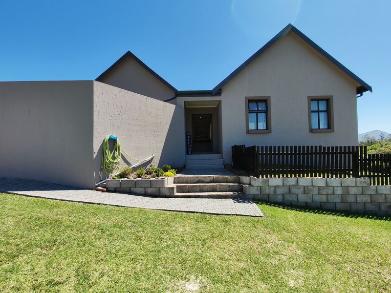 Modern 3-Bedroom Home in Secure Kraaibosch Country Estate - Photo 4