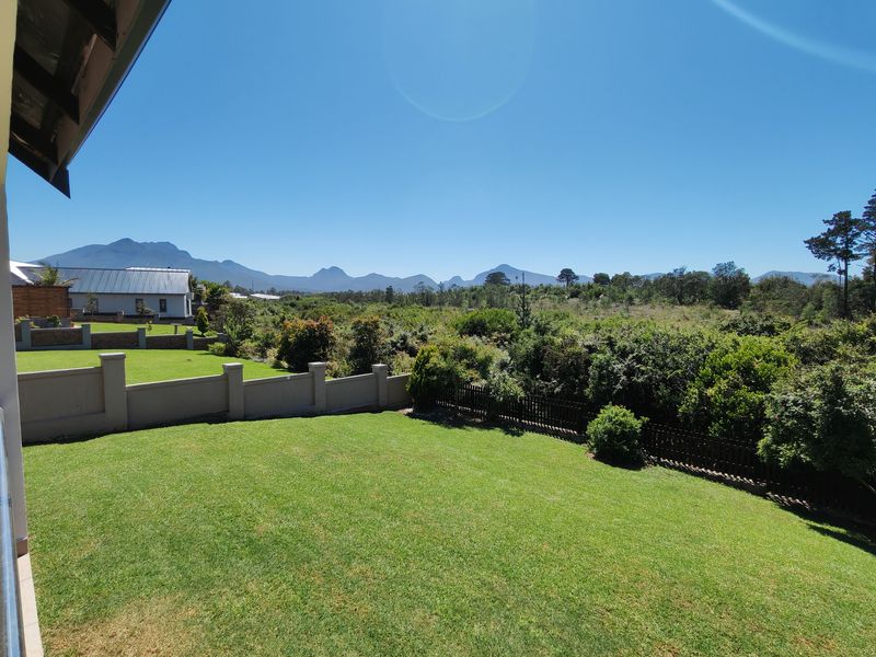 Modern 3-Bedroom Home in Secure Kraaibosch Country Estate - Photo 9