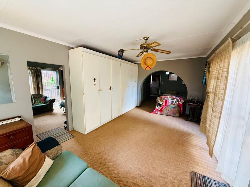 Spacious Family Retreat with Versatile Living & Income Potential - Photo 8