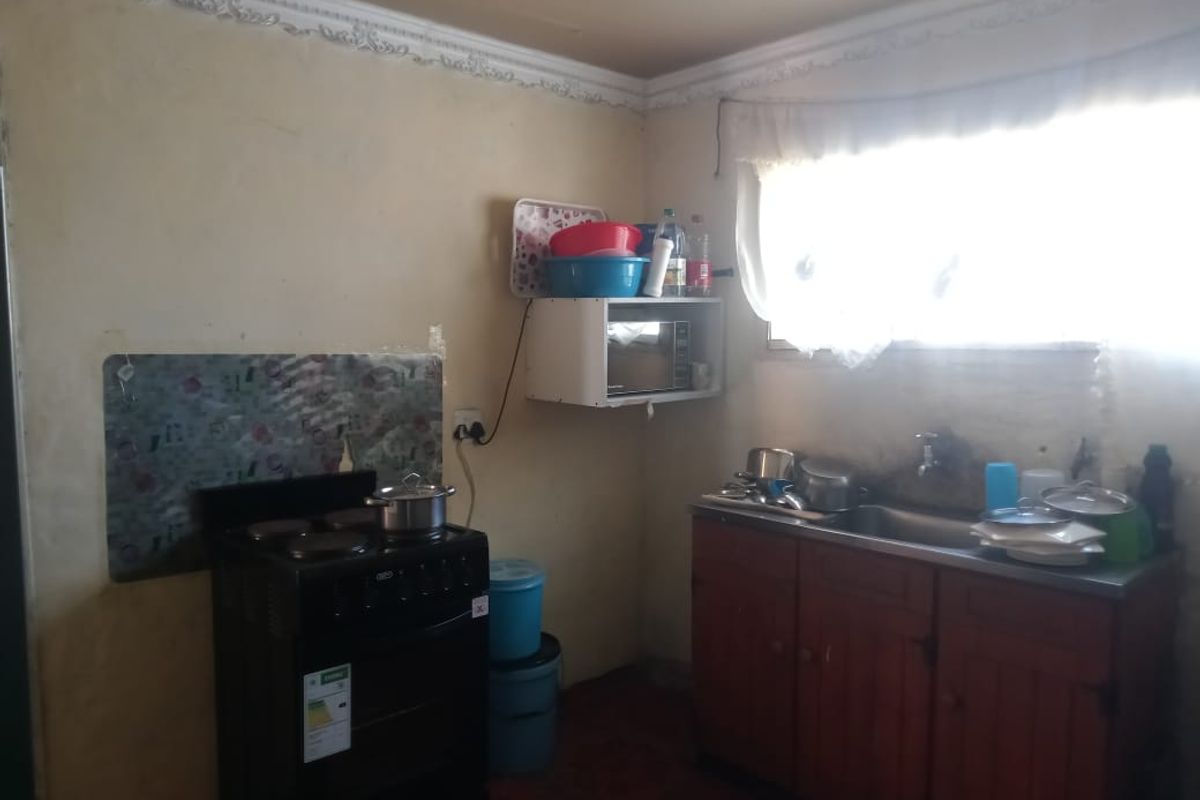 2 Bedroom Fixer-Upper with Spacious Yard in NU 13 - Photo 4