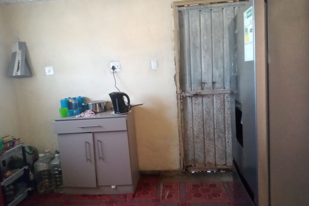 2 Bedroom Fixer-Upper with Spacious Yard in NU 13 - Photo 3