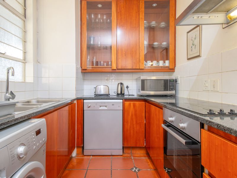 Elegant Fully Furnished 2 Bedroom Apartment on the 6th Floor – Prime Sandton Location - Photo 6